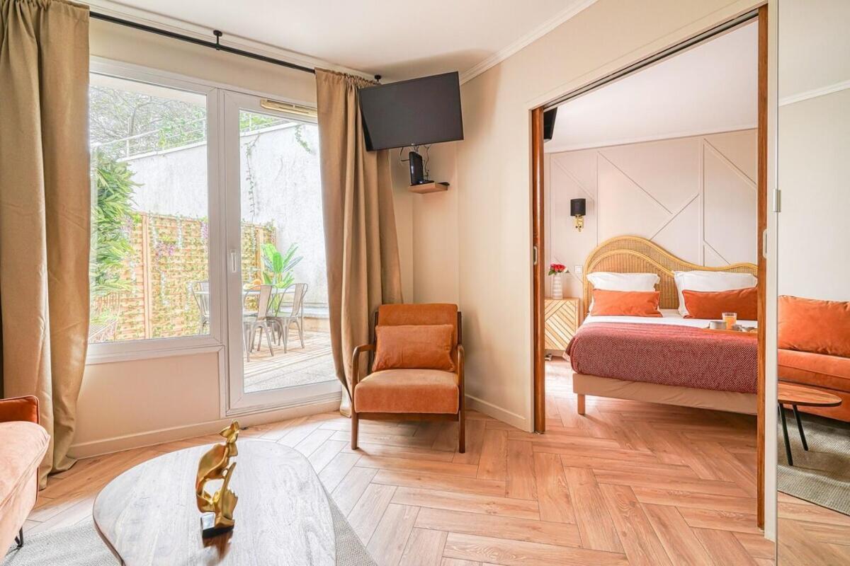 Eden Suite Paris La Defense กูร์เบอวัวร์ ภายนอก รูปภาพ