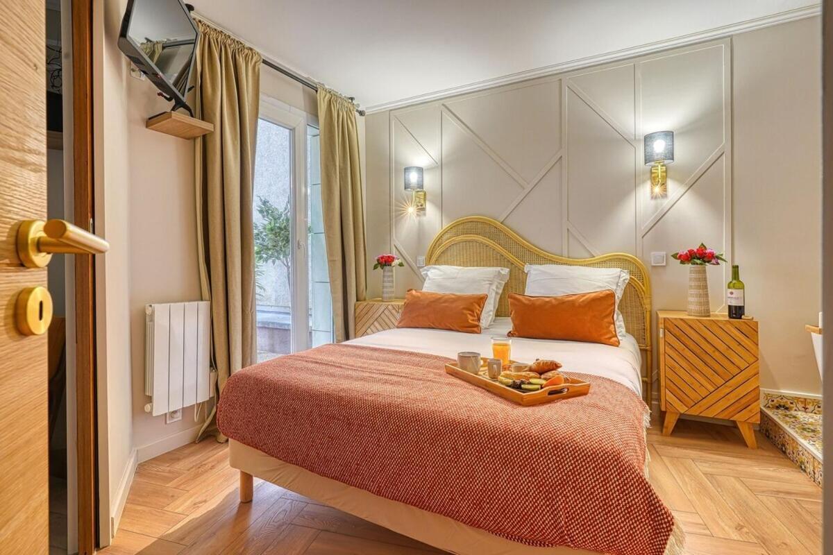 Eden Suite Paris La Defense กูร์เบอวัวร์ ภายนอก รูปภาพ